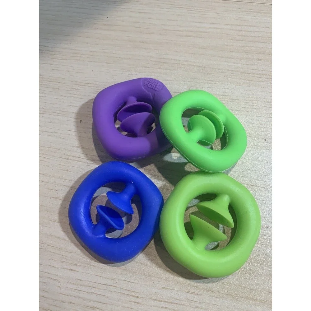 Snapper Fidget Toy Lot of 4 Used 2 green one purple and 1 blue